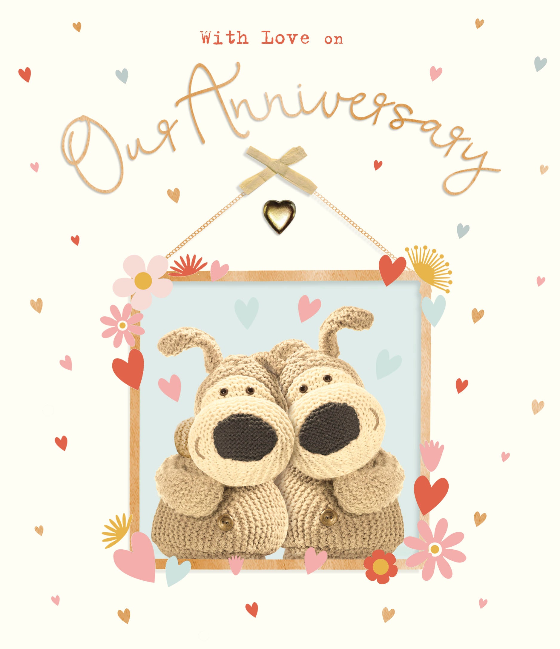 Card with two knitted dogs in a frame, surrounded by hearts and flowers, with 'With Love on Our Anniversary' text.